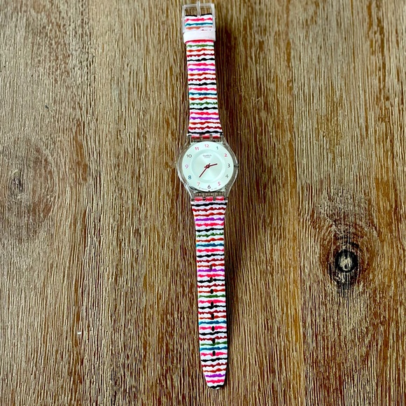 Swatch Accessories - Girls swatch watch with embroidery strap.